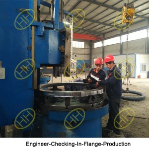 Engineer-Checking-In-Flange-Production