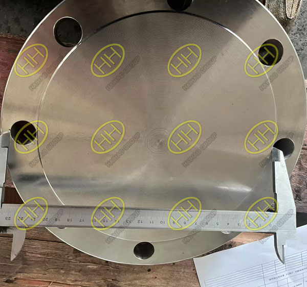 Inspection of ASME B16.5 A182 UNS S31803 blind flange for surface finish and dimensional tolerances
